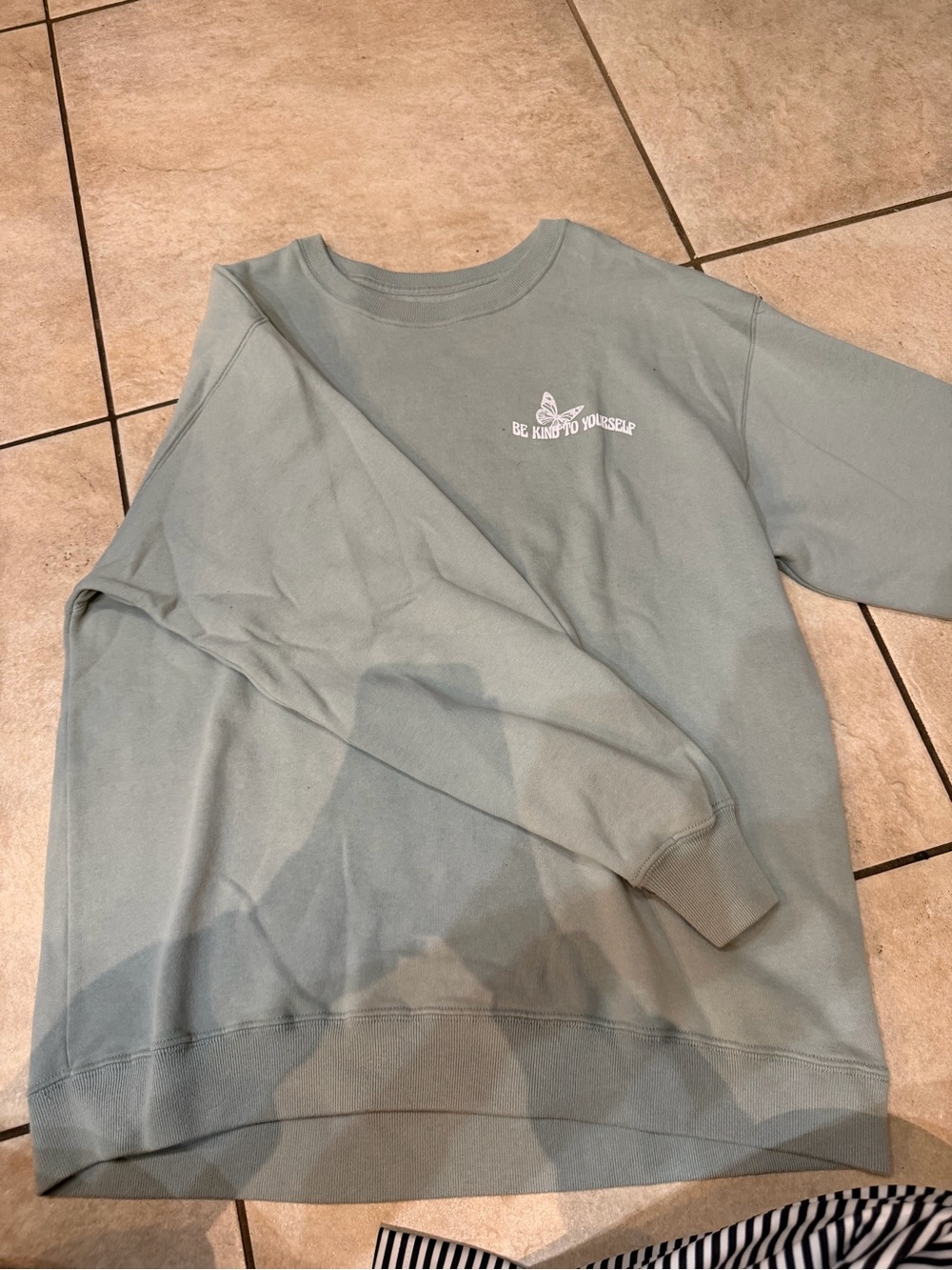 Hollister Light Sage Crewneck Sweatshirt with White "Be Kind to Yourself" Print